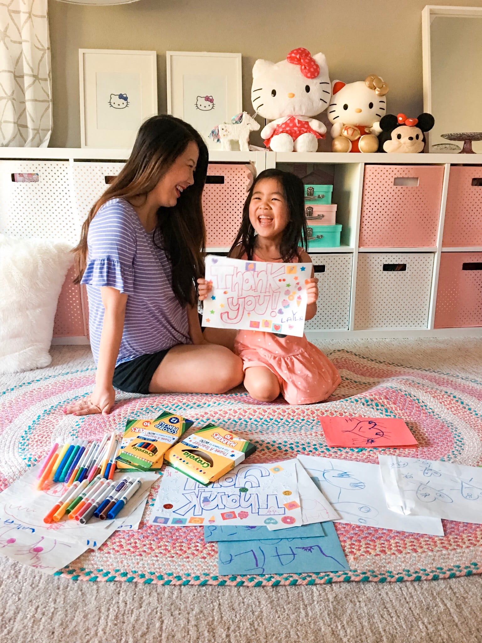 Mom and daughter coloring together