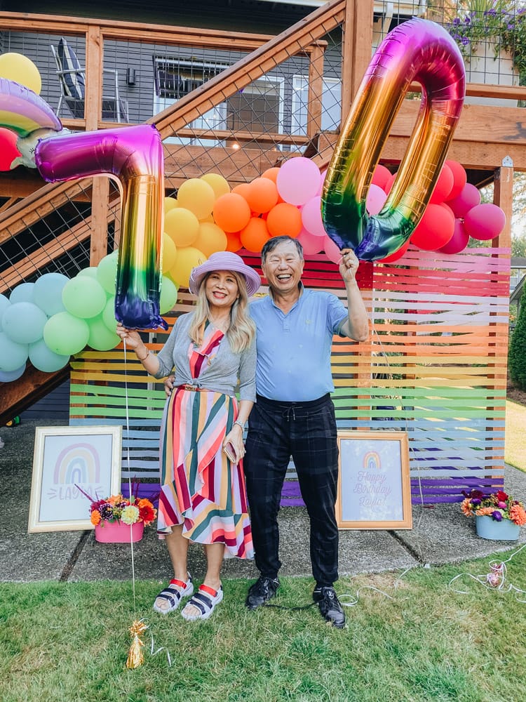 family at rainbow theme party