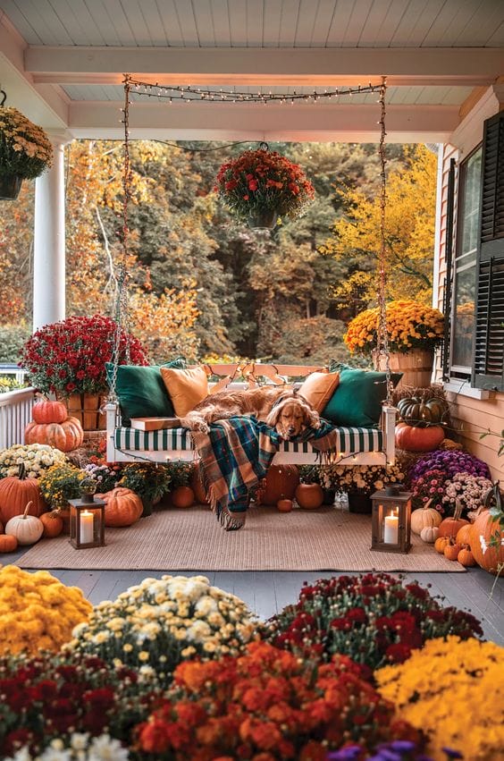 Cozy fall front porch swing decor