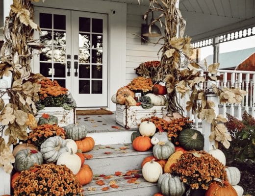 front porch with pumpkins