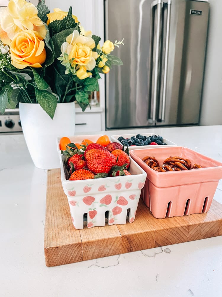 Ceramic Berry Baskets filled with fruit and snacks