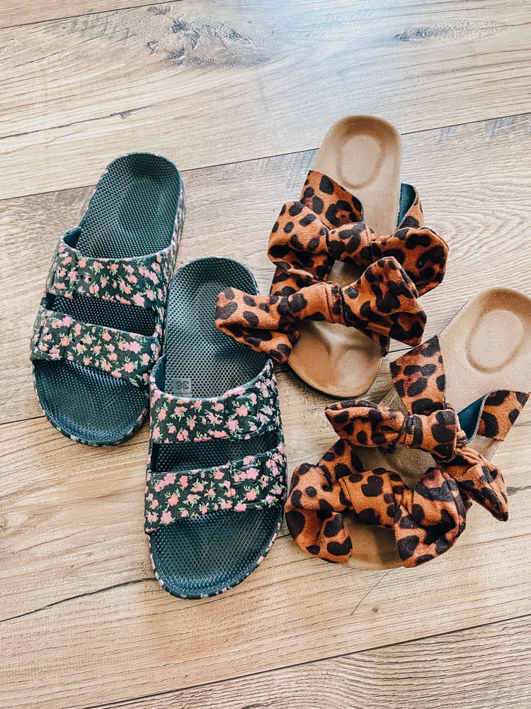 two pairs of shoes - floral slides and leopard bow sandals
