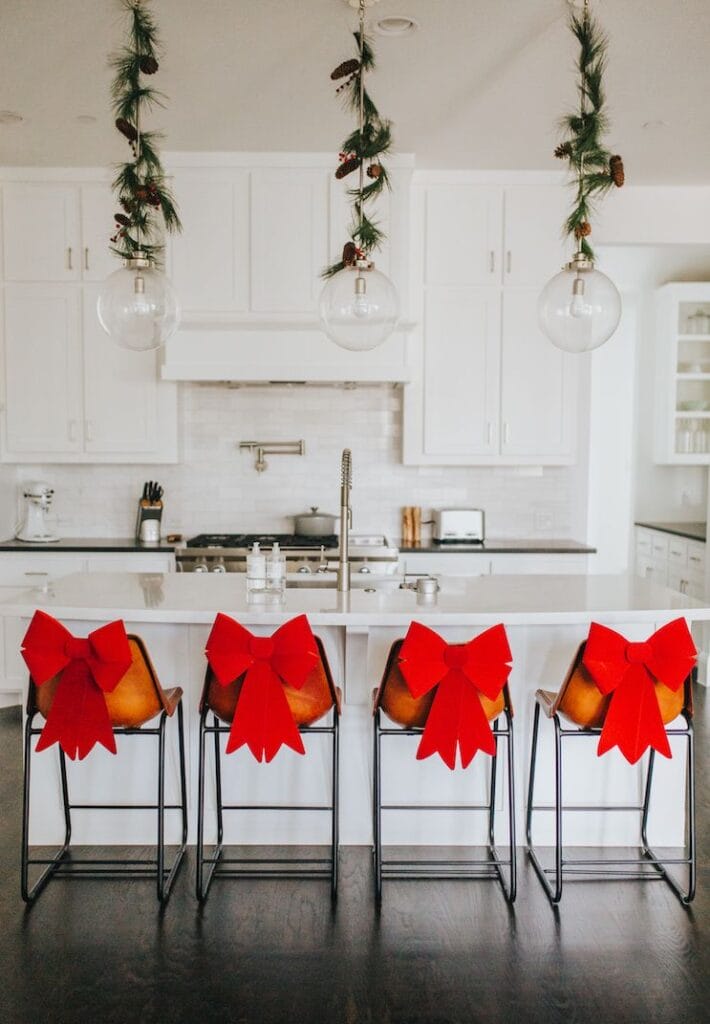 Kitchen Christmas Garland Ideas and bows on stools