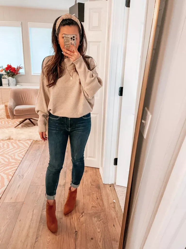 cuffed skinny jeans and brown booties