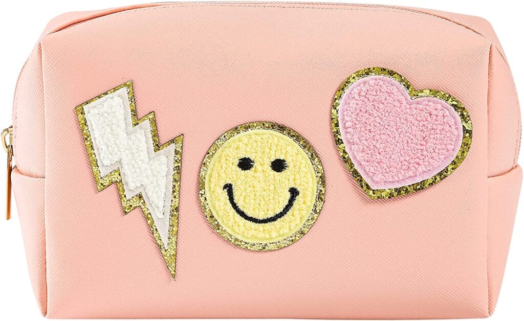 pink makeup bag with patches