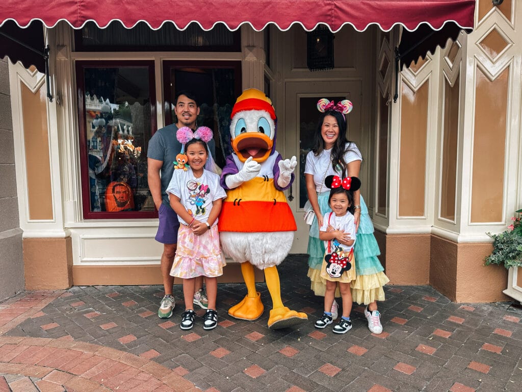 halloween at disneyland, donald duck dressed up as candy corn